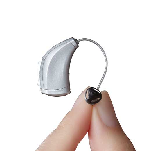 RIC hearing aid in hand