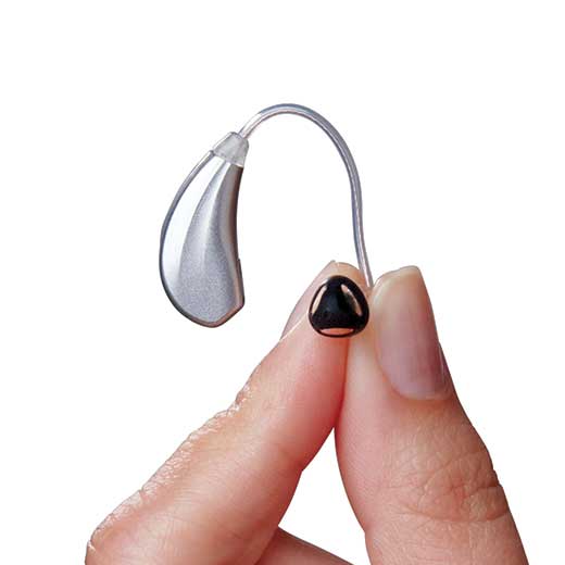 Tinnitus hearing aid in hand