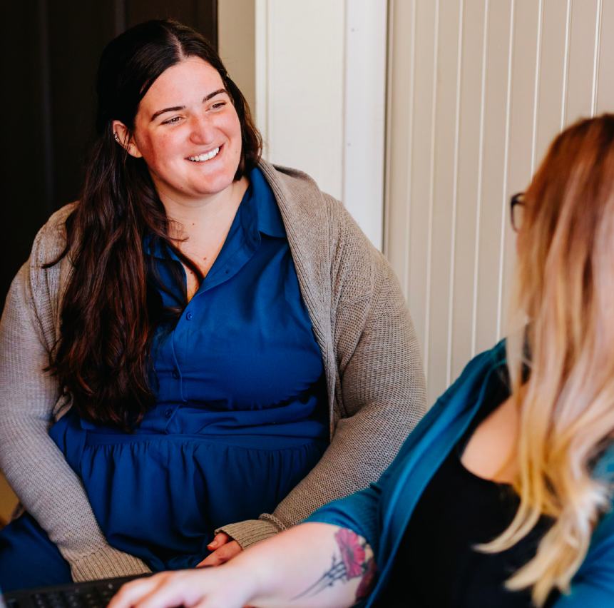Kelly Brown talking with patient